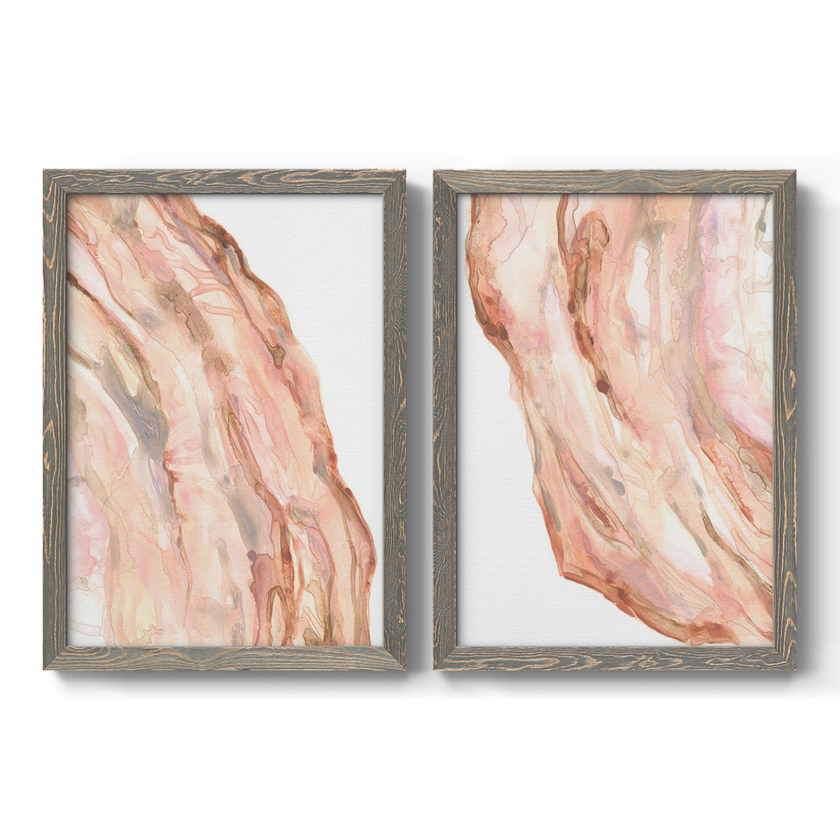 Set of two gray barnwood framed canvas prints featuring two soft marble-inspired abstracts featuring flowing blush peach and cream mineral bands.