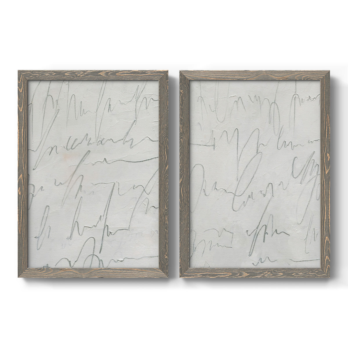 Set of two gray barnwood framed canvas prints featuring two minimalist script abstracts featuring faint looping handwriting across pale gray grounds.