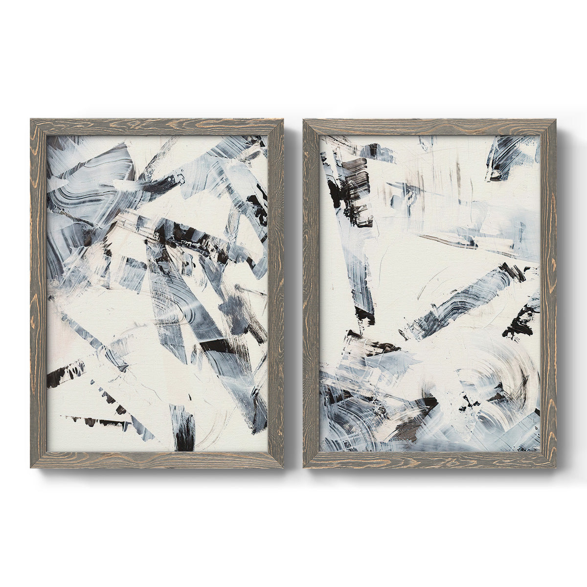 Set of two gray barnwood framed canvas prints featuring two high-contrast gestural abstracts featuring angular black and gray brush fragments on white.