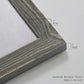 Close-up of the gray barnwood frame corner and gallery-wrapped canvas construction.