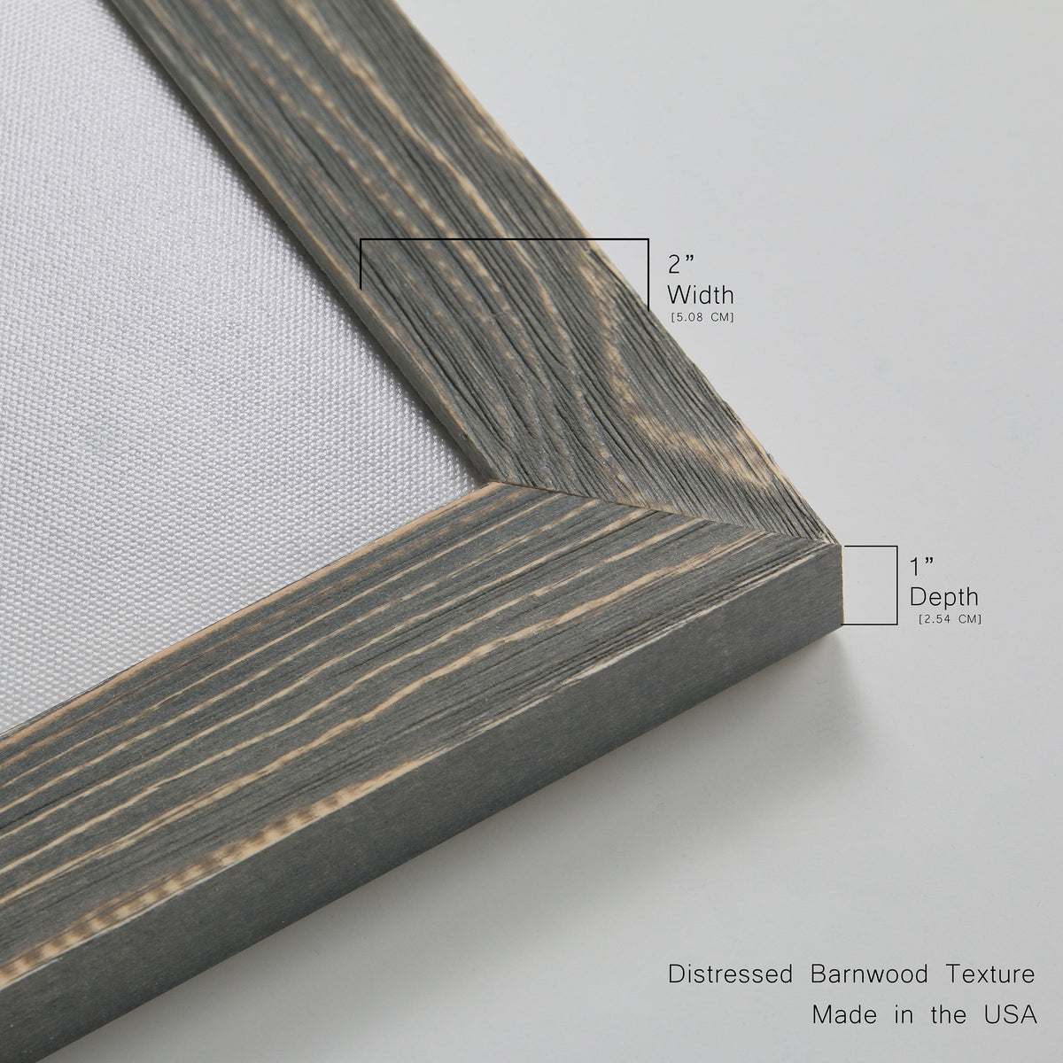 Close-up of the gray barnwood frame corner and gallery-wrapped canvas construction.