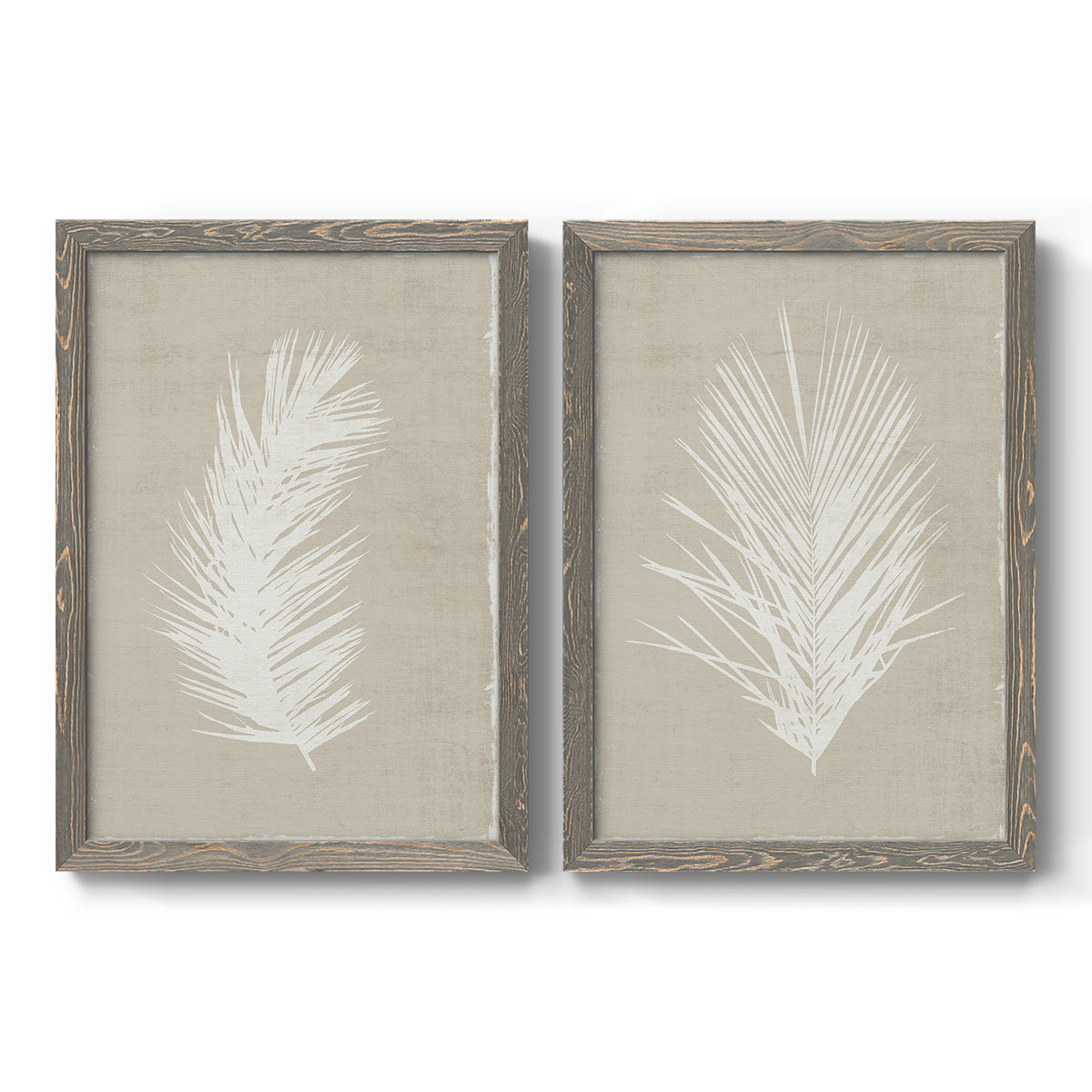 Set of two gray barnwood framed canvas prints featuring two minimalist tropical botanical prints featuring white palm frond silhouettes.