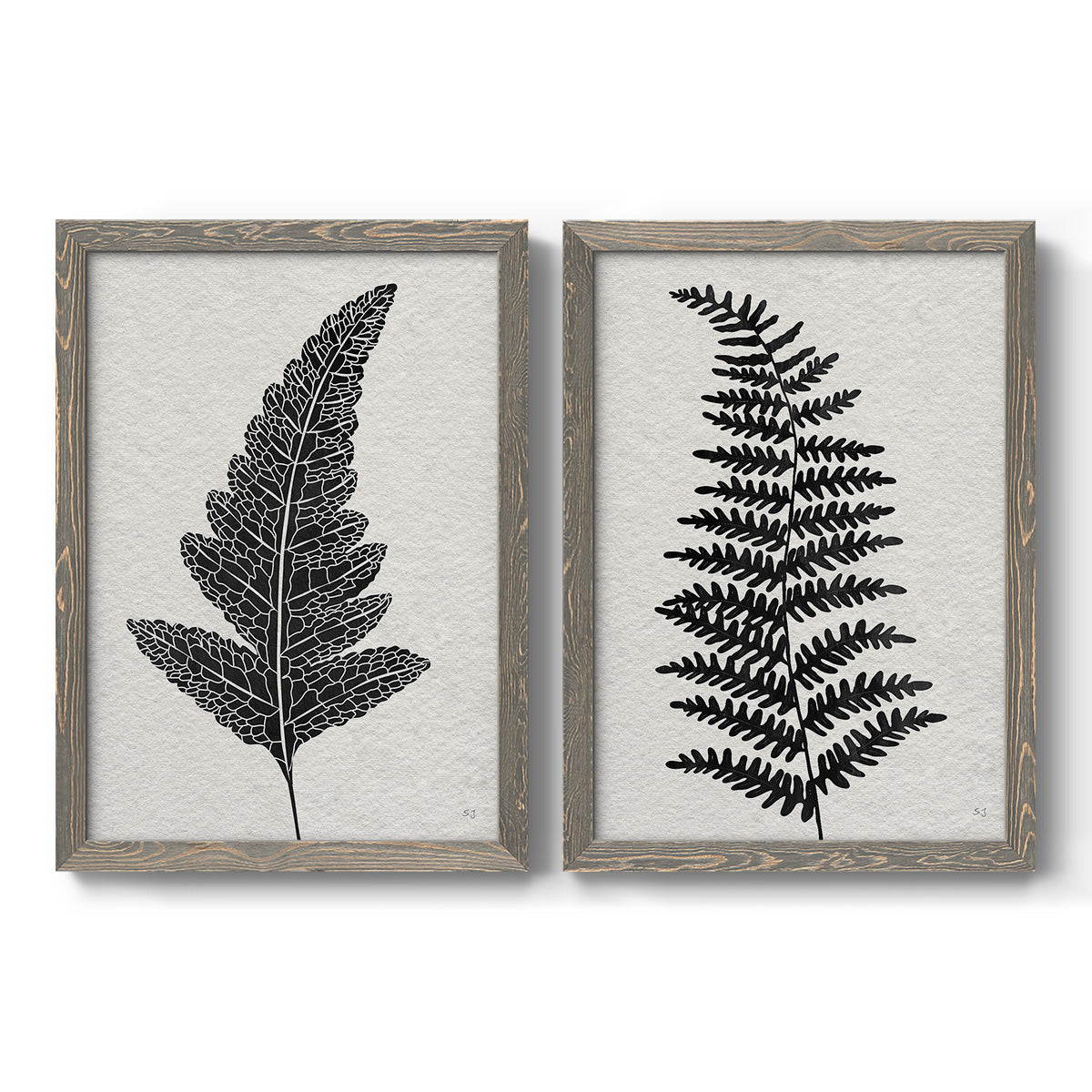 Set of two gray barnwood framed canvas prints featuring two minimalist botanical prints featuring black fern leaf silhouettes.