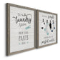 Angled view of a set of two gray barnwood framed canvas prints featuring two rustic typographic wall art featuring humorous laundry-room sayings and clothing icons.