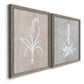 Angled view of a set of two gray barnwood framed canvas prints featuring two rustic minimalist botanical prints featuring white botanical silhouettes on softly weathered neutral backgrounds.