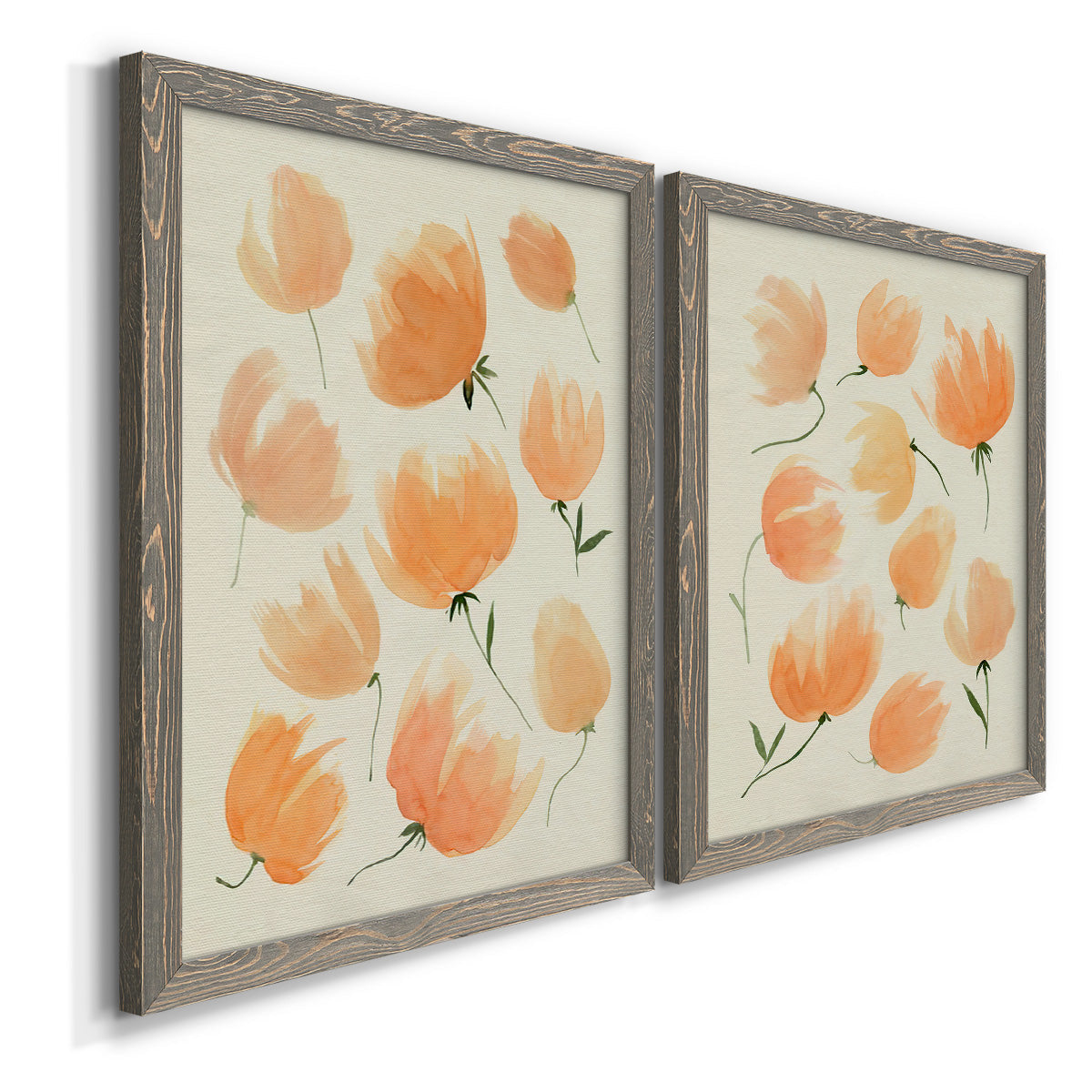 Angled view of a set of two gray barnwood framed canvas prints featuring two airy watercolor floral paintings featuring loose peach-orange tulip-like blossoms.