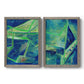 Set of two gray barnwood framed canvas prints featuring two textured geometric abstracts featuring interlocking blue and green angular forms.