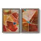 Set of two gray barnwood framed canvas prints featuring two warm geometric abstracts featuring faceted rust orange and coral geometric fields.