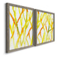 Angled view of a set of two gray barnwood framed canvas prints featuring two fluid organic abstracts featuring branching watercolor lines drifting across white.