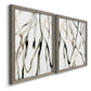 Angled view of a set of two gray barnwood framed canvas prints featuring two fluid organic abstracts featuring branching watercolor lines drifting across white.