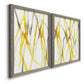 Angled view of a set of two gray barnwood framed canvas prints featuring two fluid organic abstracts featuring branching watercolor lines drifting across white.