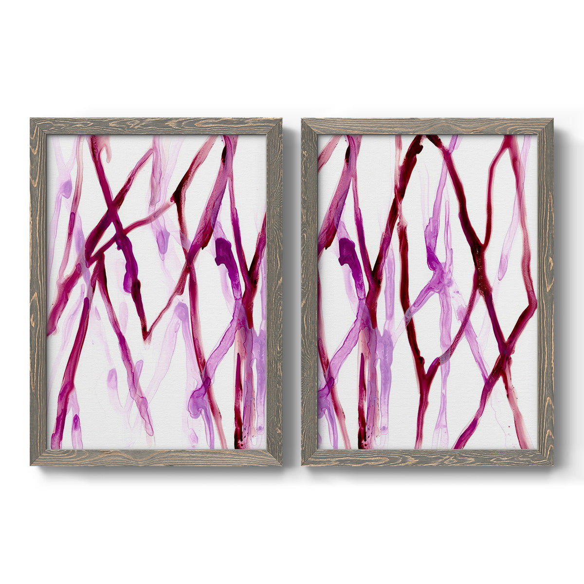 Set of two gray barnwood framed canvas prints featuring two fluid organic abstracts featuring branching watercolor lines drifting across white.