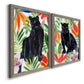 Angled view of a set of two gray barnwood framed canvas prints featuring two vibrant watercolor wildlife illustrations featuring black panthers surrounded by colorful tropical foliage.