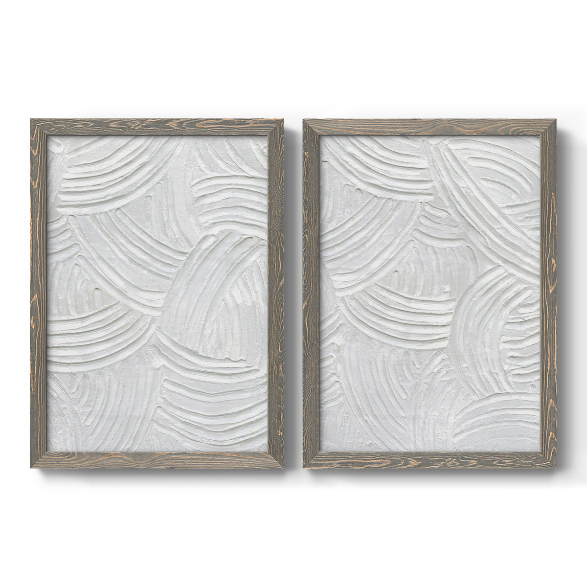 Set of two gray barnwood framed canvas prints featuring two textural monochrome abstracts featuring overlapping white carved arcs and ridges.