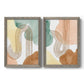Set of two gray barnwood framed canvas prints featuring two folk-inspired botanical patterns featuring repeating indigo floral and leaf motifs.
