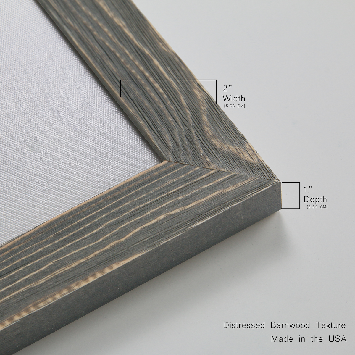 Close-up of the gray barnwood frame corner and gallery-wrapped canvas construction.