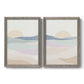 Set of two gray barnwood framed canvas prints featuring two minimalist abstract landscapes featuring layered pastel waves beneath a pale setting sun.