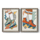 Set of two gray barnwood framed canvas prints featuring two playful fashion illustrations featuring colorful retro roller skates and patterned socks.