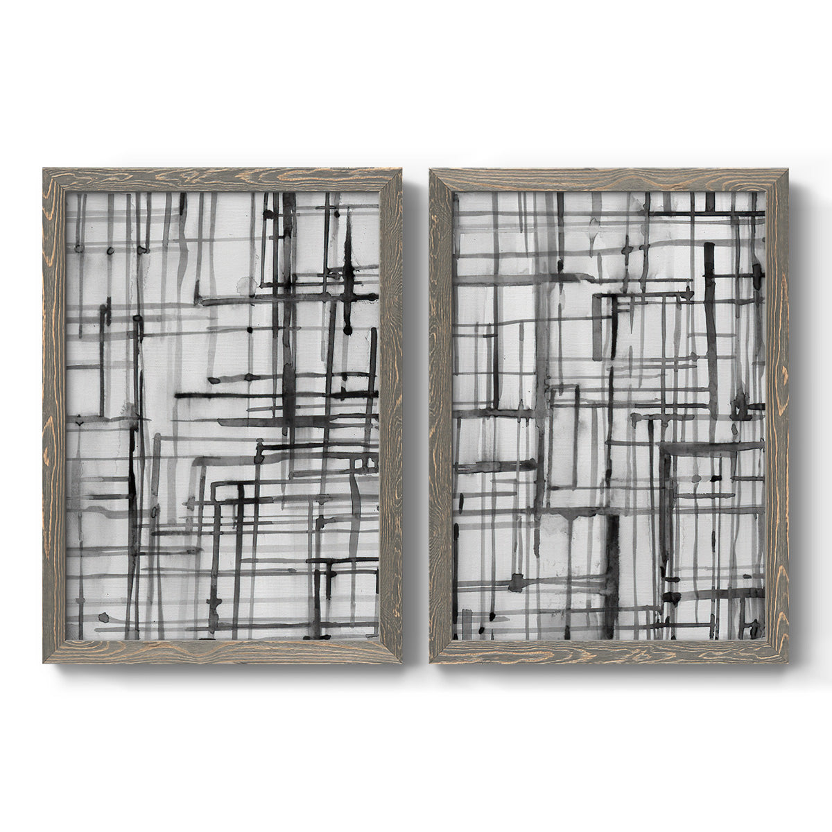 Set of two gray barnwood framed canvas prints featuring two monochrome geometric abstracts featuring layered black linear grids.