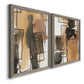 Angled view of a set of two gray barnwood framed canvas prints featuring two retro geometric abstracts featuring earthy watercolor blocks crossed by black contour lines.