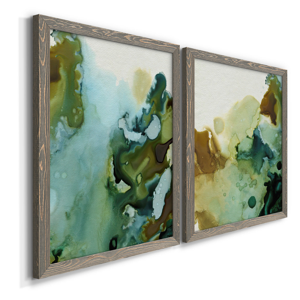 Angled view of a set of two gray barnwood framed canvas prints featuring two organic watercolor abstracts featuring fluid green blue and earthy brown ink pools.