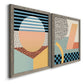 Angled view of a set of two gray barnwood framed canvas prints featuring two retro graphic abstracts featuring bold geometric Memphis-style patterns.