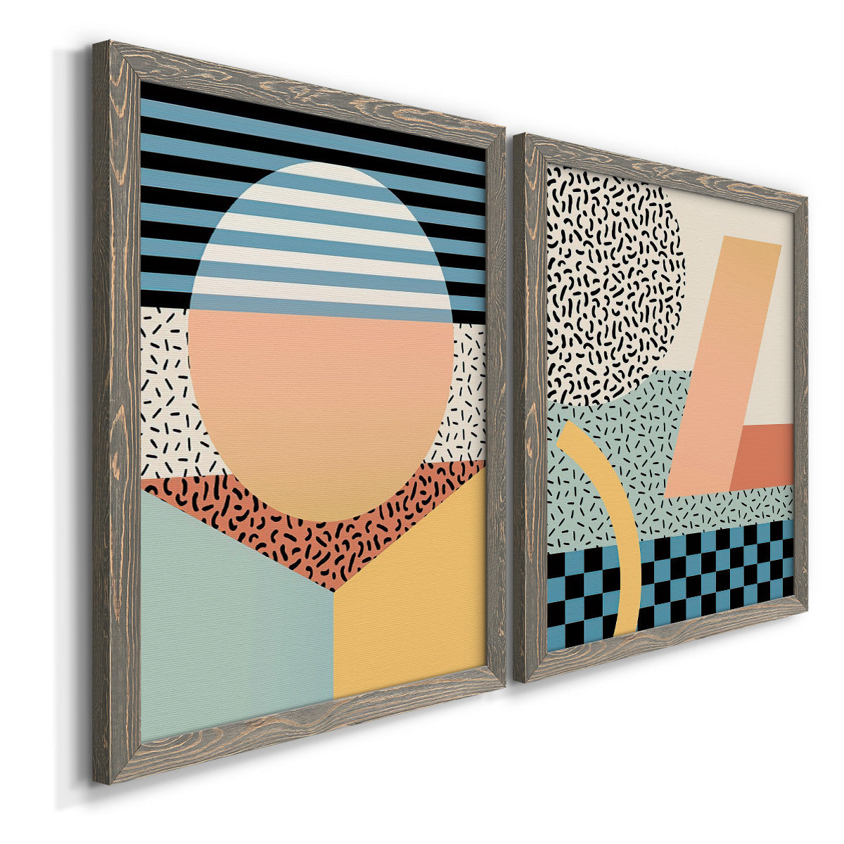 Angled view of a set of two gray barnwood framed canvas prints featuring two retro graphic abstracts featuring bold geometric Memphis-style patterns.