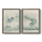 Set of two gray barnwood framed canvas prints featuring two minimalist watercolor seascapes with misty green clouds calm horizons and pale reflective water.