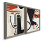 Angled view of a set of two gray barnwood framed canvas prints featuring two mixed-media portrait collages featuring cubist faces layered over vintage book pages.