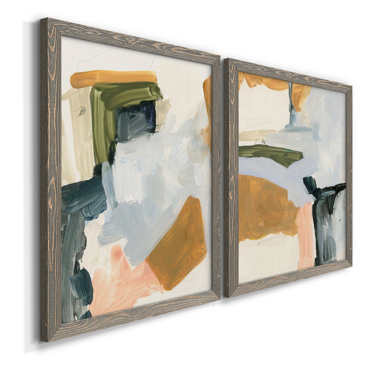 Angled view of a set of two gray barnwood framed canvas prints featuring two contemporary mixed-media abstracts featuring layered green ochre blush gray and white paint blocks.