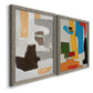 Angled view of a set of two gray barnwood framed canvas prints featuring two mid-century geometric abstracts featuring stacked gray cream blue and bright geometric blocks.