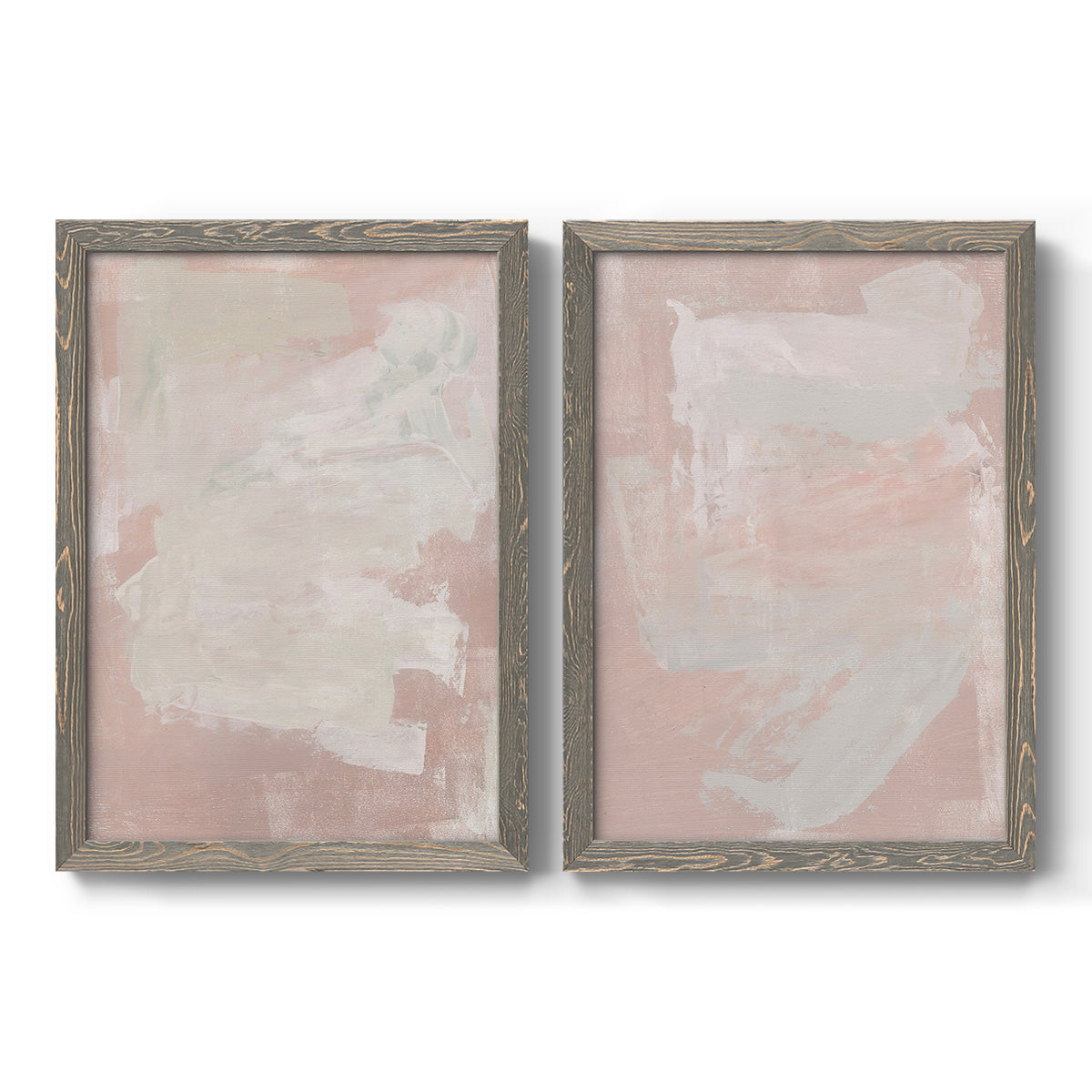 Set of two gray barnwood framed canvas prints featuring two minimalist color-field abstracts featuring soft blush and white painterly fields.
