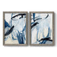 Set of two gray barnwood framed canvas prints featuring two expressive blue abstracts featuring sweeping indigo and black gestural brushwork.