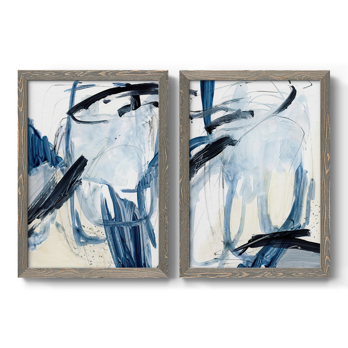 Set of two gray barnwood framed canvas prints featuring two expressive blue abstracts featuring sweeping indigo and black gestural brushwork.