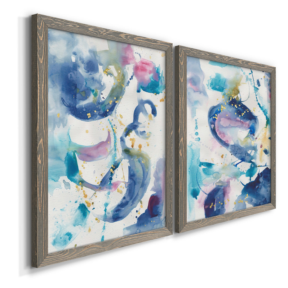 Angled view of a set of two gray barnwood framed canvas prints featuring two colorful lyrical abstracts featuring lively blue pink violet and turquoise watercolor gestures.