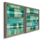 Angled view of a set of two gray barnwood framed canvas prints featuring two graphic woven-pattern abstracts featuring dense rows of teal black and white linear marks.