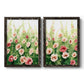Set of two black barnwood framed canvas prints featuring two luminous impressionistic floral paintings featuring a field of pink coral and white flowers.