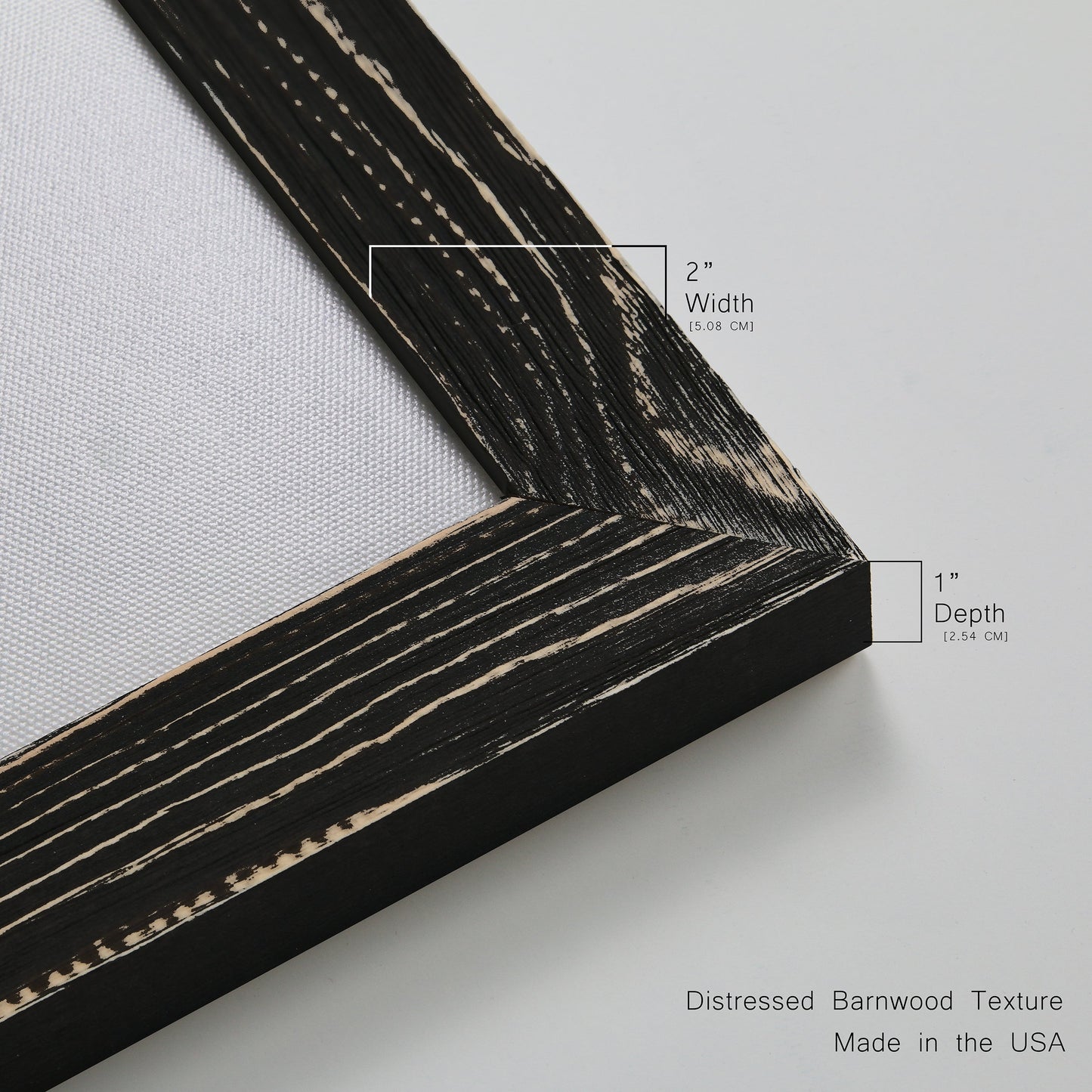Close-up of the black barnwood frame corner and gallery-wrapped canvas construction.