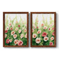 Set of two maple barnwood framed canvas prints featuring two luminous impressionistic floral paintings featuring a field of pink coral and white flowers.