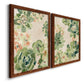 Angled view of a set of two maple barnwood framed canvas prints featuring two decorative botanical pattern prints featuring dense repeating succulents and small flowers.
