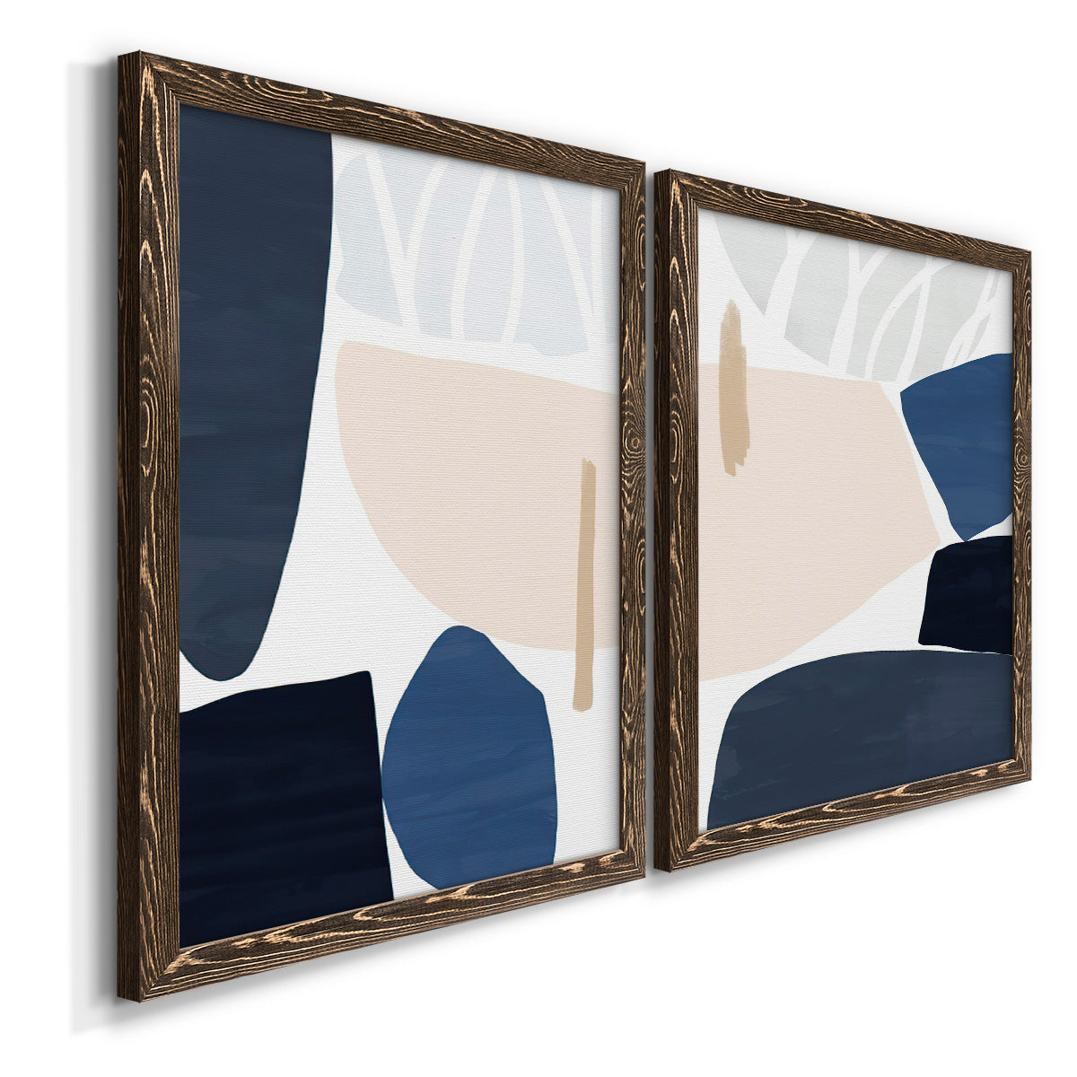 Angled view of a set of two walnut barnwood framed canvas prints featuring two minimalist color-block abstracts featuring large navy cream and beige organic geometric shapes.