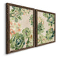 Angled view of a set of two walnut barnwood framed canvas prints featuring two decorative botanical pattern prints featuring dense repeating succulents and small flowers.