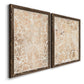 Angled view of a set of two walnut barnwood framed canvas prints featuring two vintage decorative prints featuring ornate cream floral damask patterns.