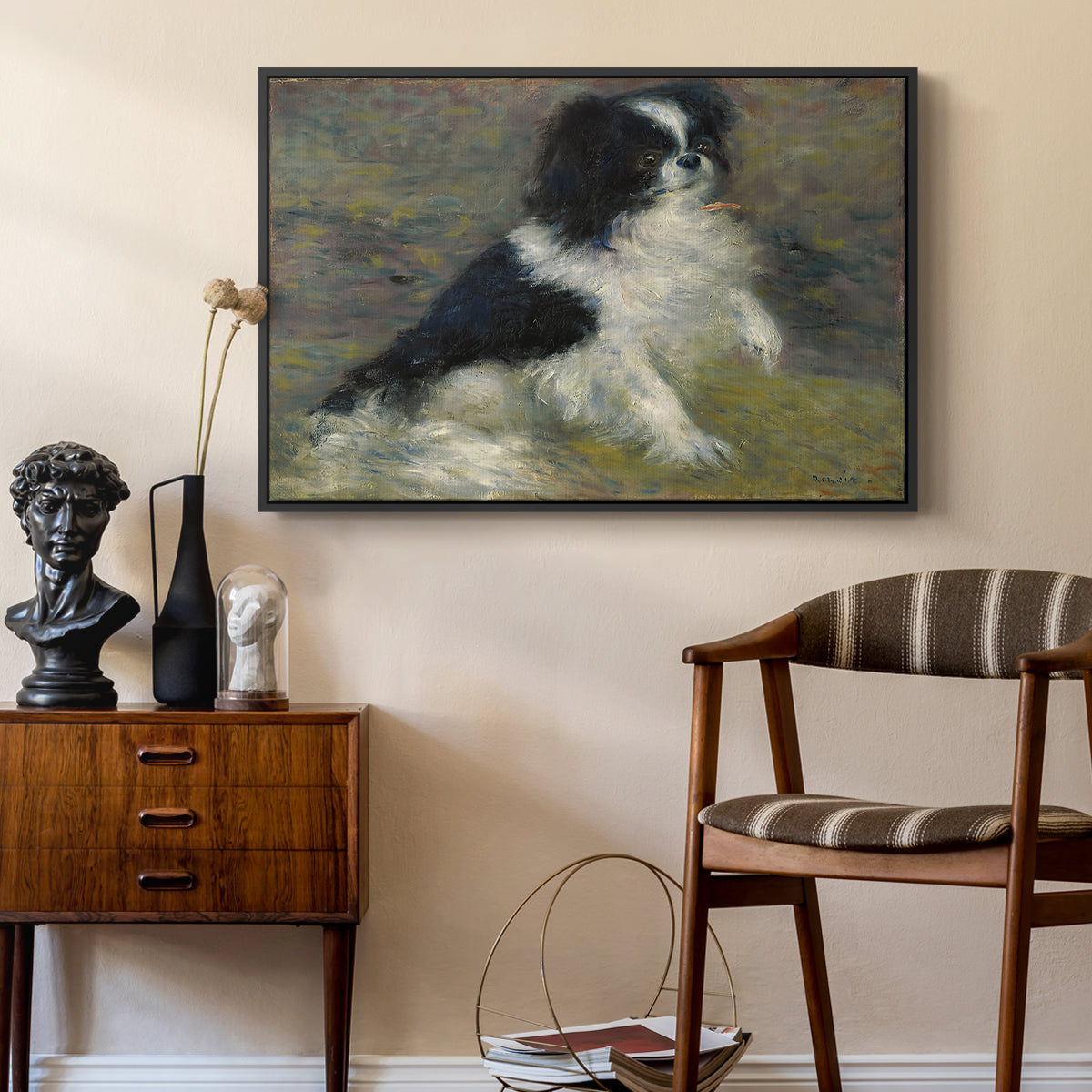 Tama, the Japanese Dog, c. 1876 by Pierre-Auguste Renoir as a black floater framed canvas featuring a close-up of a small dog in motion surrounded by rippling water, styled above a mid-century console in a contemporary living area.