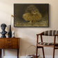 An Eagle Owl (Berguv), 1905 by Bruno Liljefors as a black floater framed canvas featuring a bird of prey resting on tree branch with textured feathers, styled above a mid-century console in a contemporary living area.