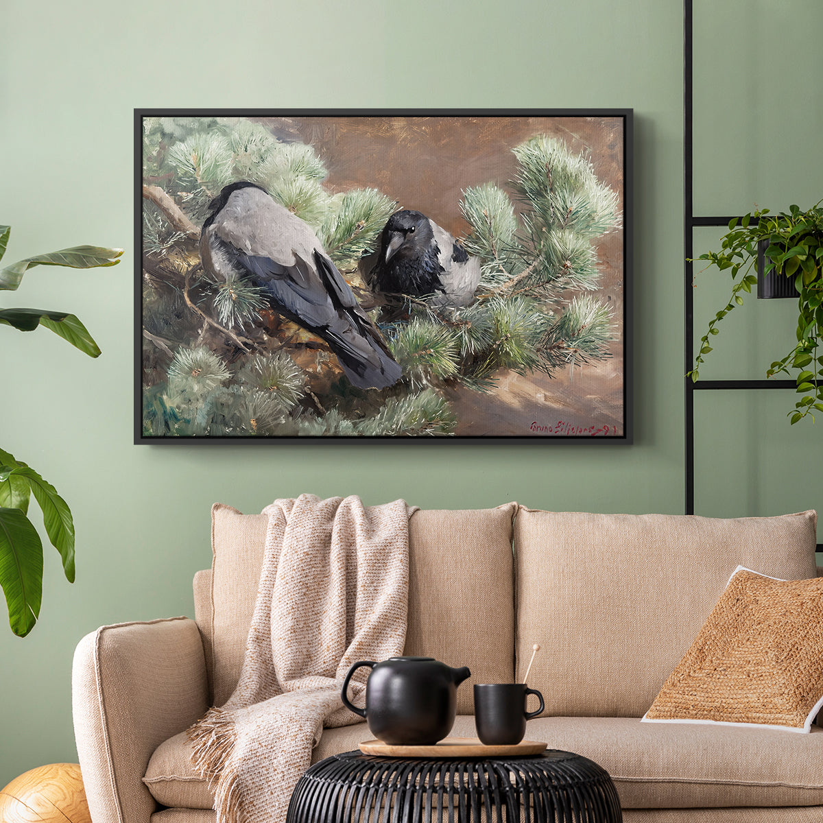 Black floater framed canvas featuring a wildlife painting of dark birds against muted landscape, displayed above a sofa in a modern living room.