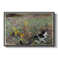 Cat on a Flowery Meadow, 1887 by Bruno Liljefors in a black floater framed canvas wall art display.