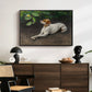 Portrait of a Dog, 1891 by Bruno Liljefors displayed in a black floater framed canvas above a dark wood credenza in an entryway.