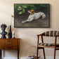 Portrait of a Dog, 1891 by Bruno Liljefors as a black floater framed canvas featuring an animal painting of dog stretched out on earthy terrain, styled above a mid-century console in a contemporary living area.