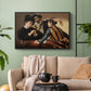 Black floater framed canvas featuring a dramatic interior scene of gambling and trickery among figures, displayed above a sofa in a modern living room.